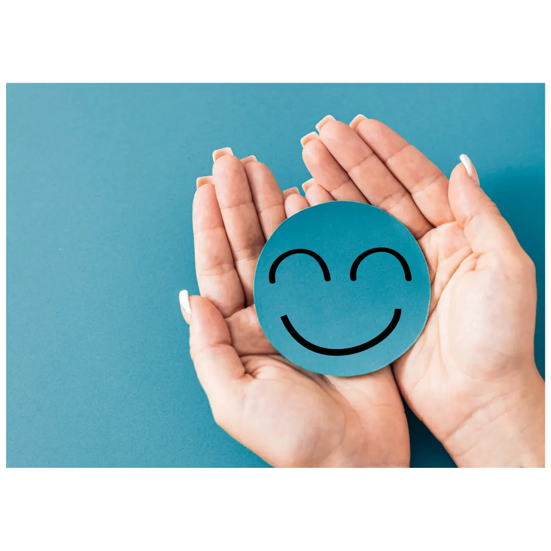 Two hands holding a smiling face